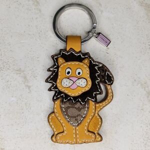 Lion Keychain by Coach - Yellow and Brown